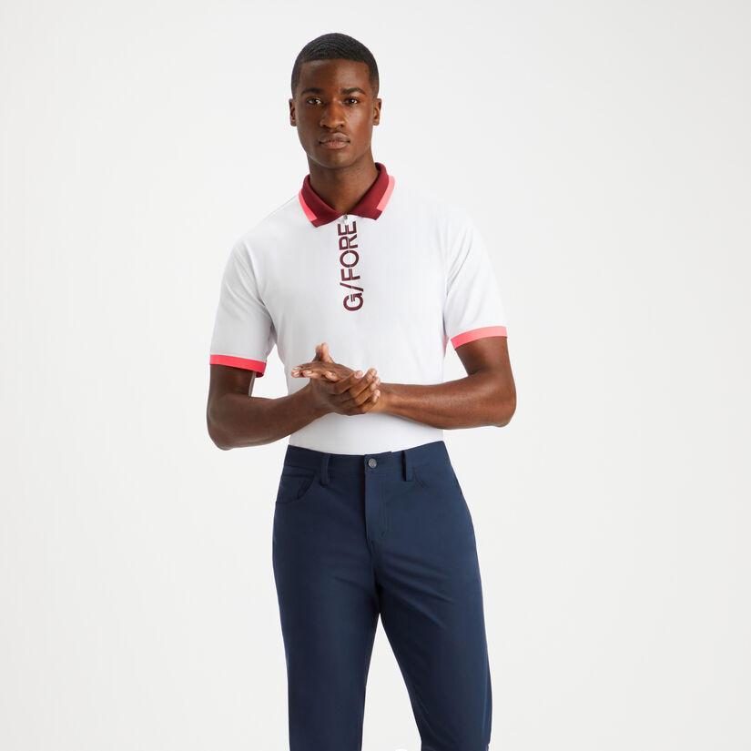 LOGO TECH PIQUÉ QUARTER ZIP SLIM FIT POLO image number 3