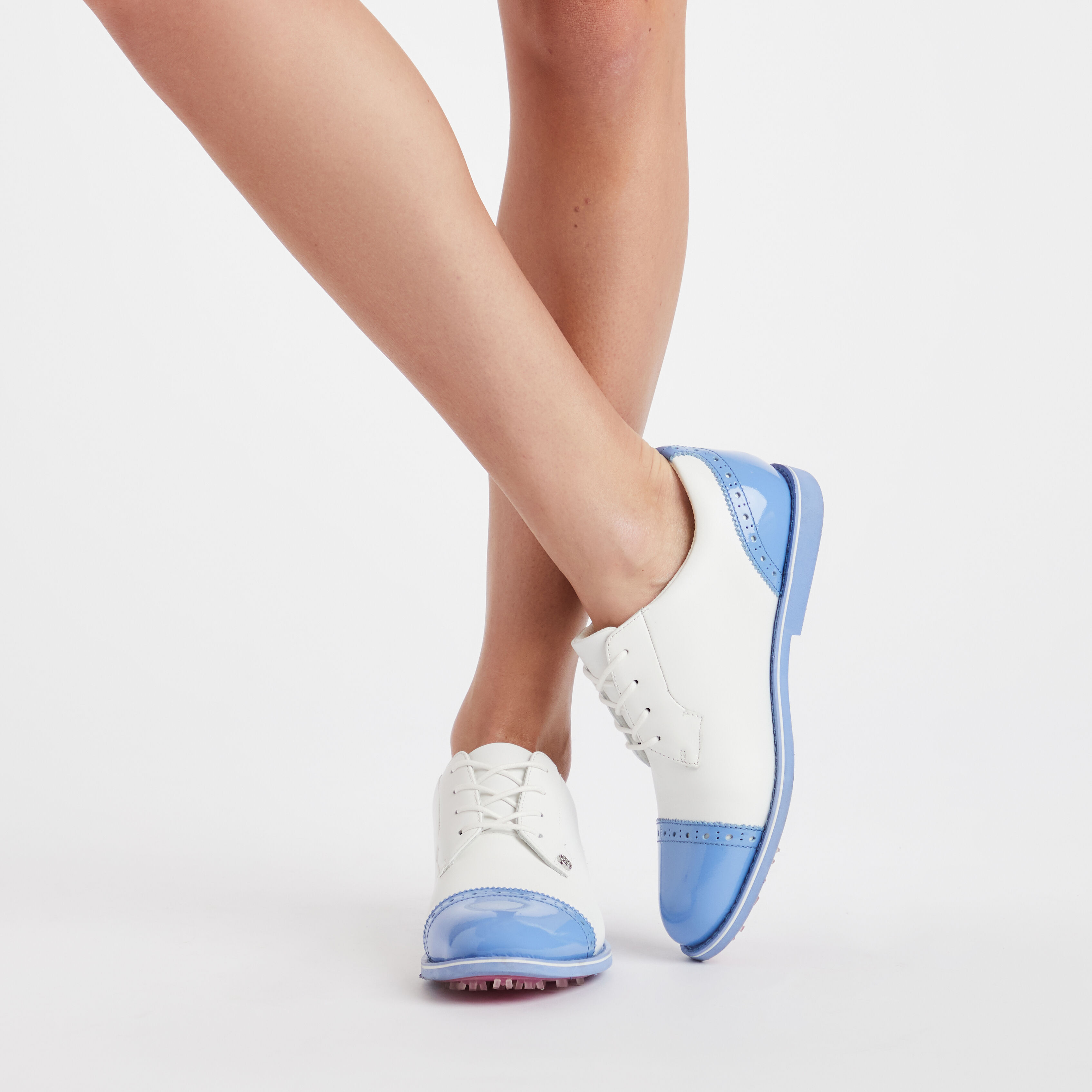 Women's cap toe sneakers online